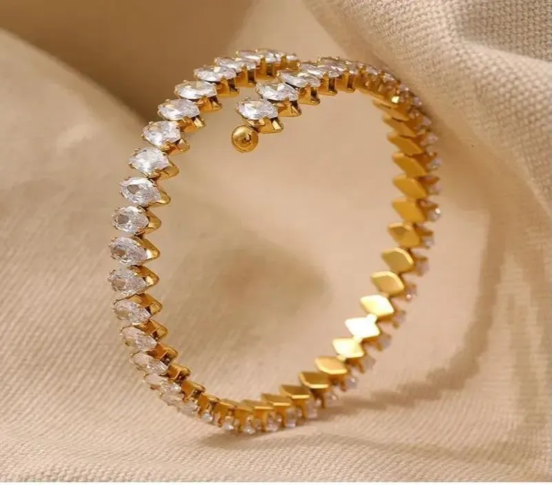 Crystal-link bracelet with alternating clear stones on ivory linen