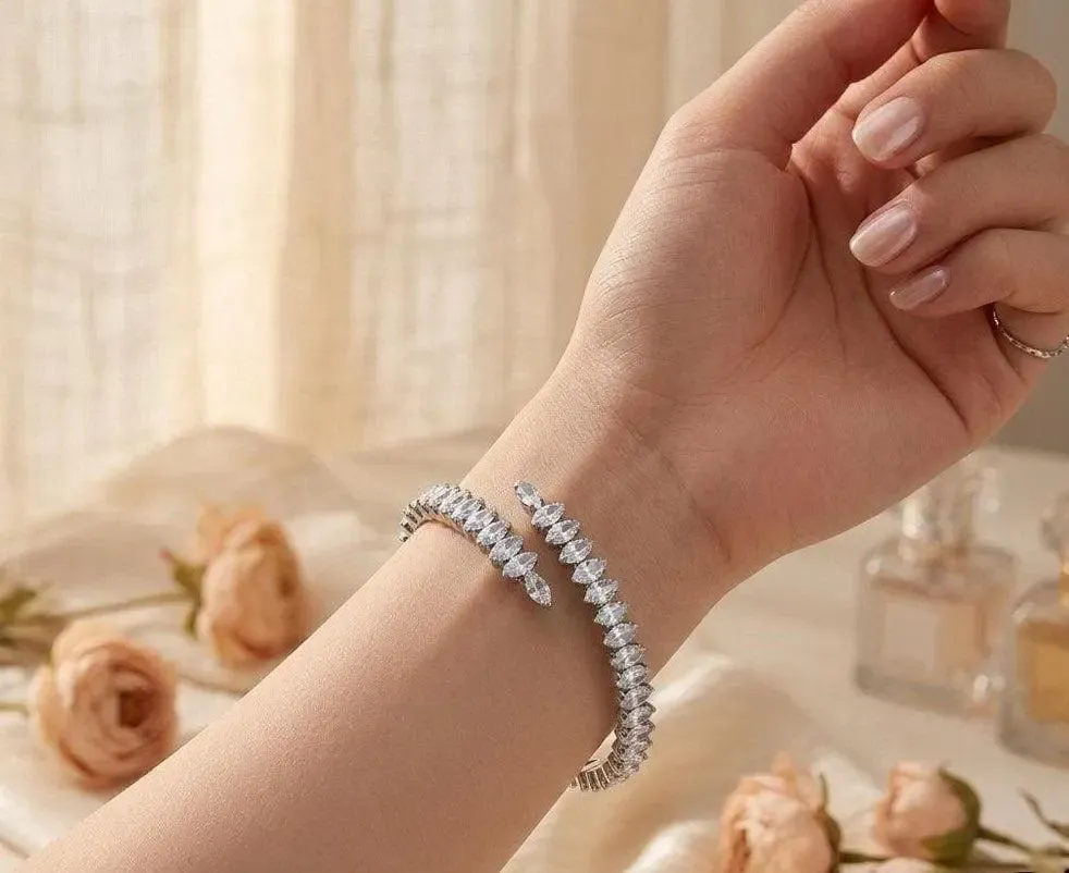 Silver-tone crystal-link bracelet worn on the wrist