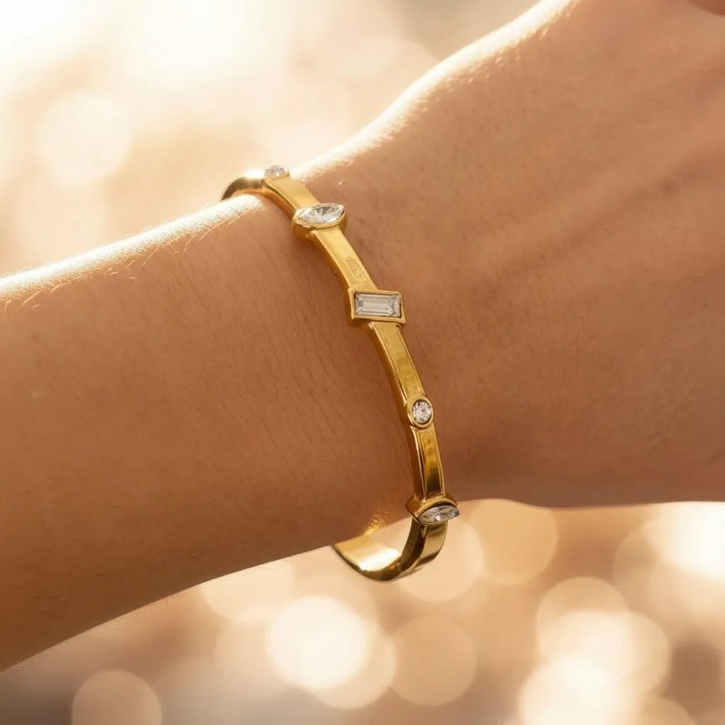 Mixed-cut stone bangle on wrist