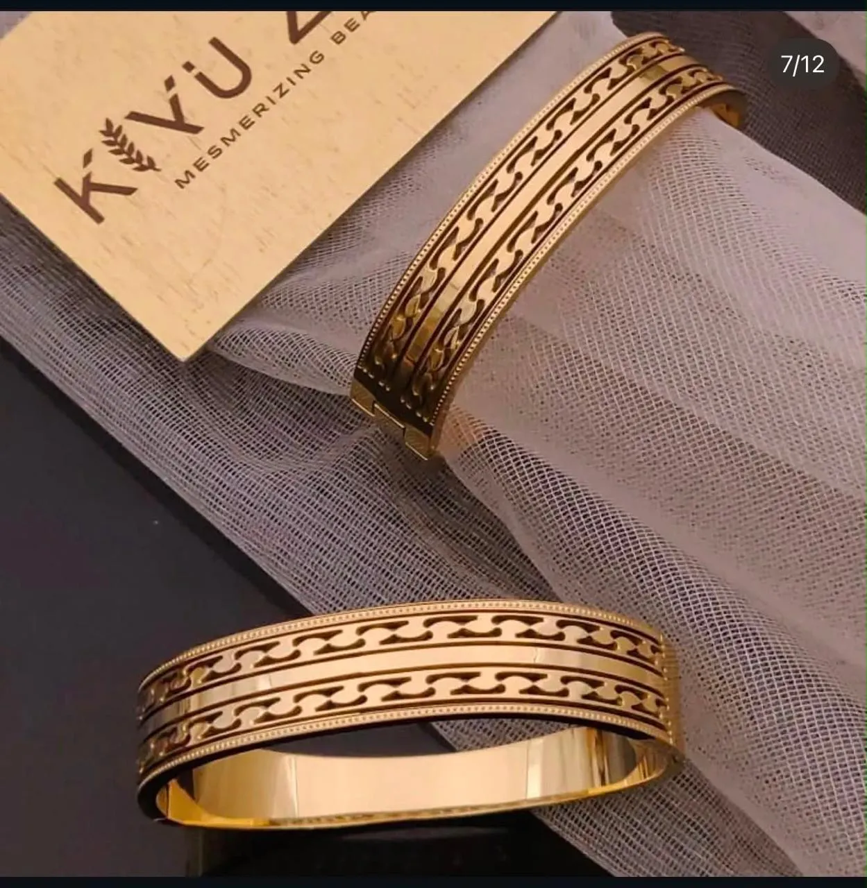 Original product reference photo of the gold-tone etched bangle